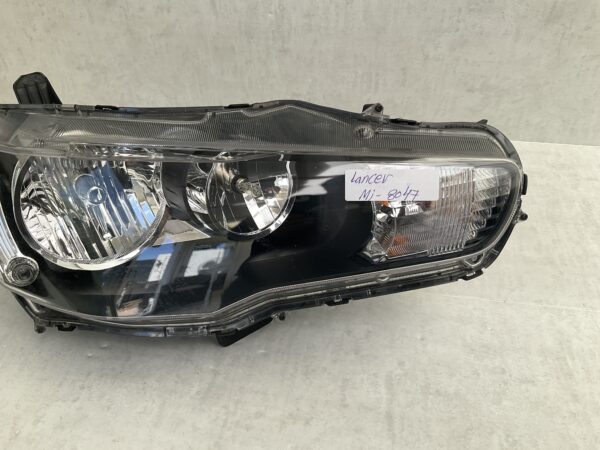 KOPLAMP MITSUBISHI LANCER 8301C3-38 MBR RECHTS MI-8047