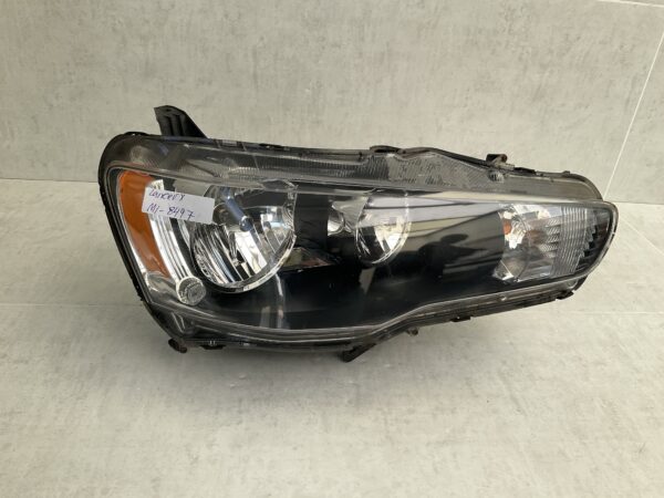 KOPLAMP MITSUBISHI LANCER X 8301C338 RECHTS MI-8497