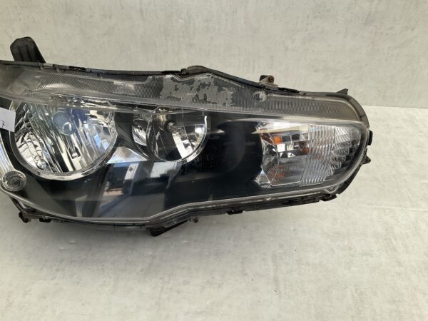 KOPLAMP MITSUBISHI LANCER X 8301C338 RECHTS MI-8497