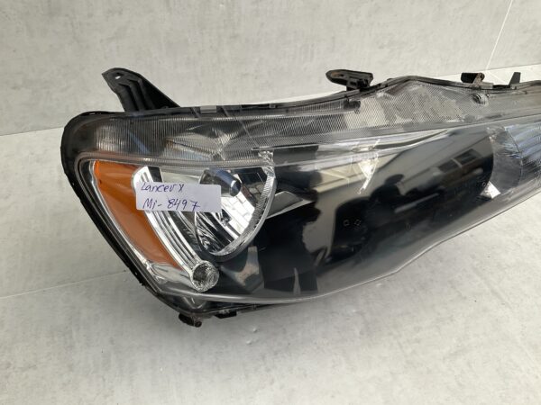 KOPLAMP MITSUBISHI LANCER X 8301C338 RECHTS MI-8497