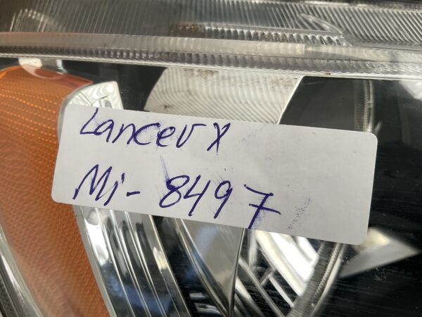KOPLAMP MITSUBISHI LANCER X 8301C338 RECHTS MI-8497