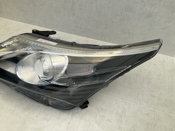 KOPLAMP TOYOTA AVENSIS H296GL-DE LINKS TO-8473