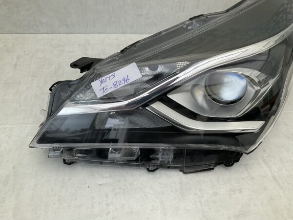 KOPLAMP TOYOTA YARIS ORIGINEEL LINKS TO-8296