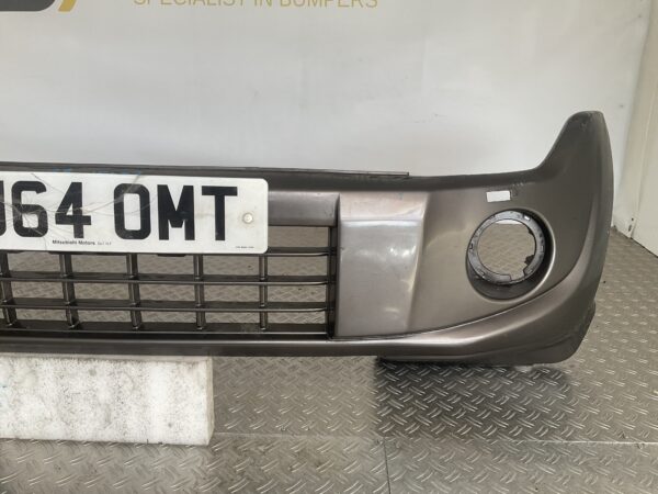 Bumper Mitsubishi Pajero IV 6400D521zz Voorbumper E8-15102z