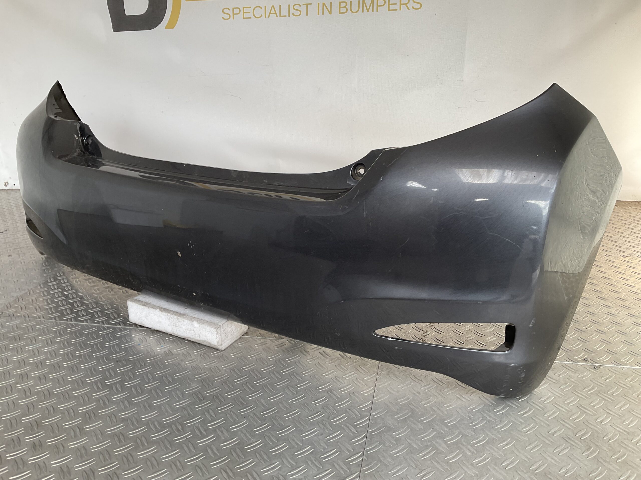 Bumper Toyota Yaris 52159-0D300 Achterbumper F4-17124z